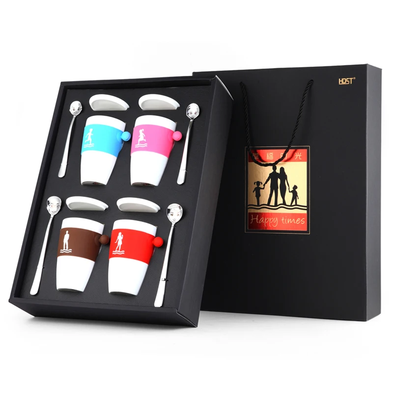 
white porcelain ceramic coffee cup with stirring spoon Gifts 2021 