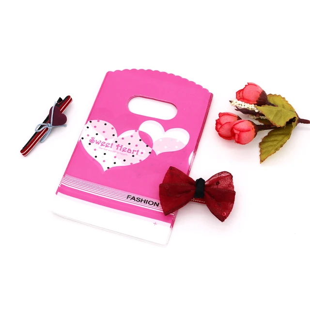 100pcs*bag Clothing store Plastic bags Handbags Shopping  Gift packaging Cosmetics thickened four-finger bags