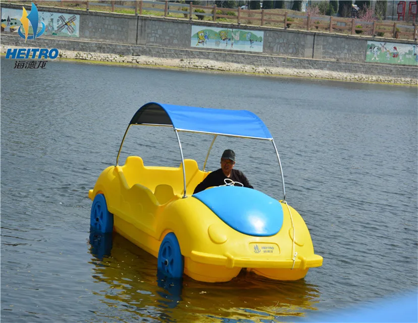 China manufacturer water pedal boat floating big car boat by pedal or electric motor for 5persons with wheels