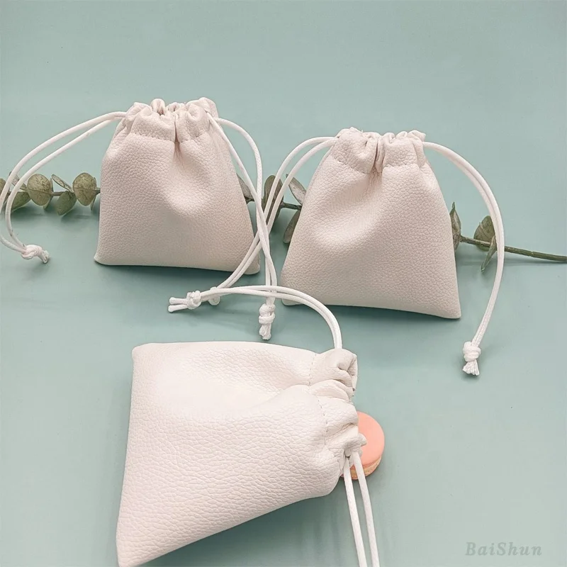Hot Sale Custom Logo Emboss Pink Pu Leather Drawstring Bag Sunglasses Power Bank Waterproof Leather Pouch