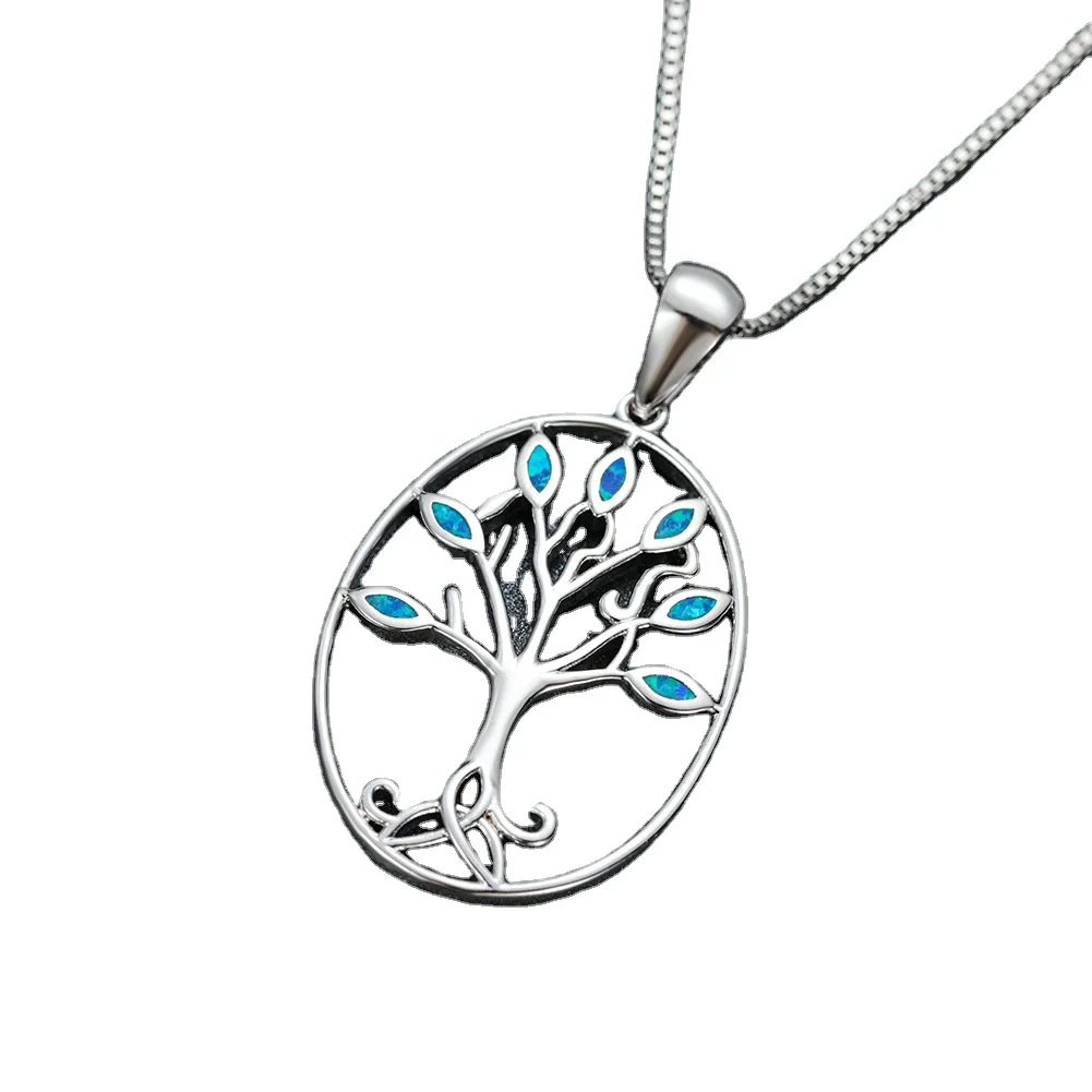 
Factory wholesale European and American round hollow small life tree opal pendant fashion creative opal tree of life pendant 