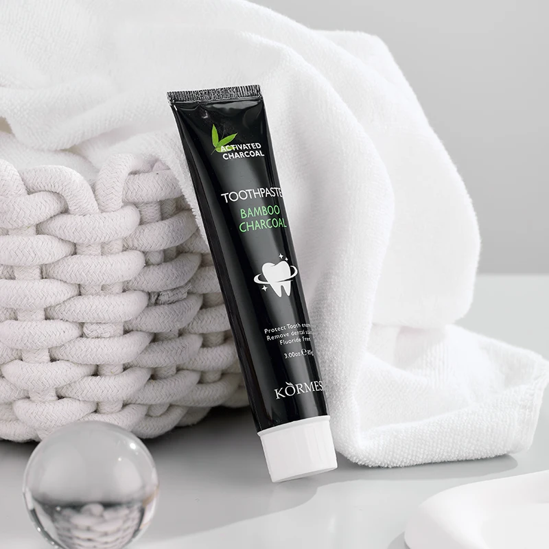OEM Private label KORMESIC Eco Friendly Natural Activated Bamboo Charcoal Teeth Whitening Mint Flavored Toothpaste