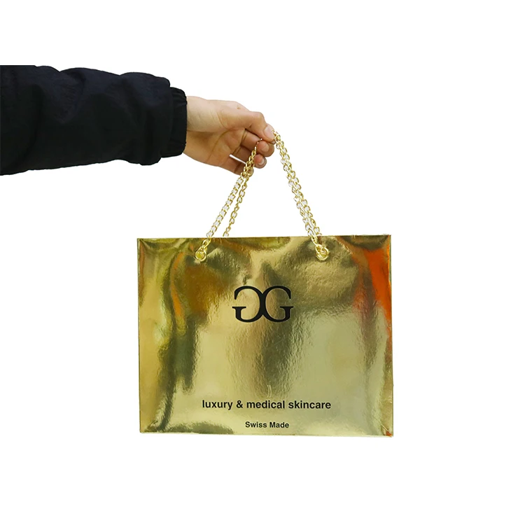 Guangzhou customized logos gold hot stamping black pink small boutique retail shopping packaging paper bags with ribbon for gift