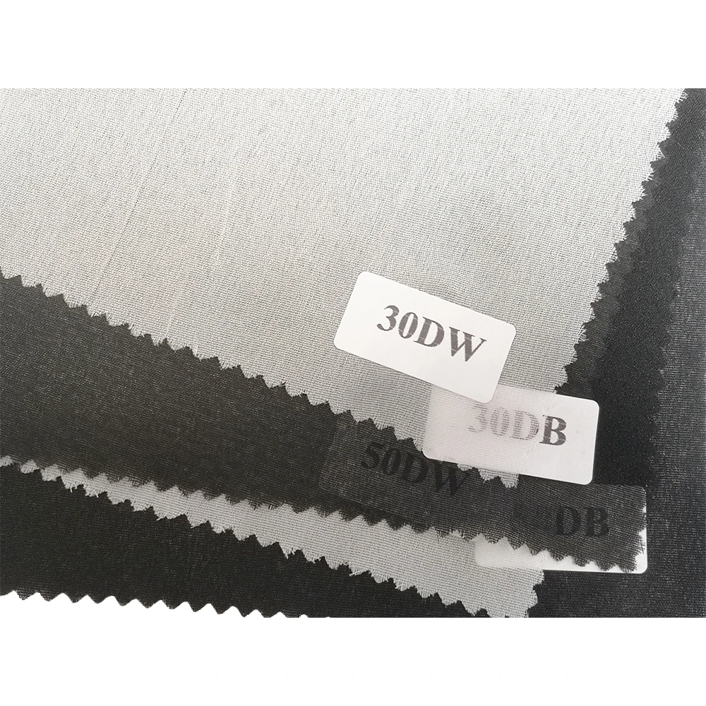 GAOXIN polyester tricot fabric eco-friendly plain weave dot fusing woven fusible interlining