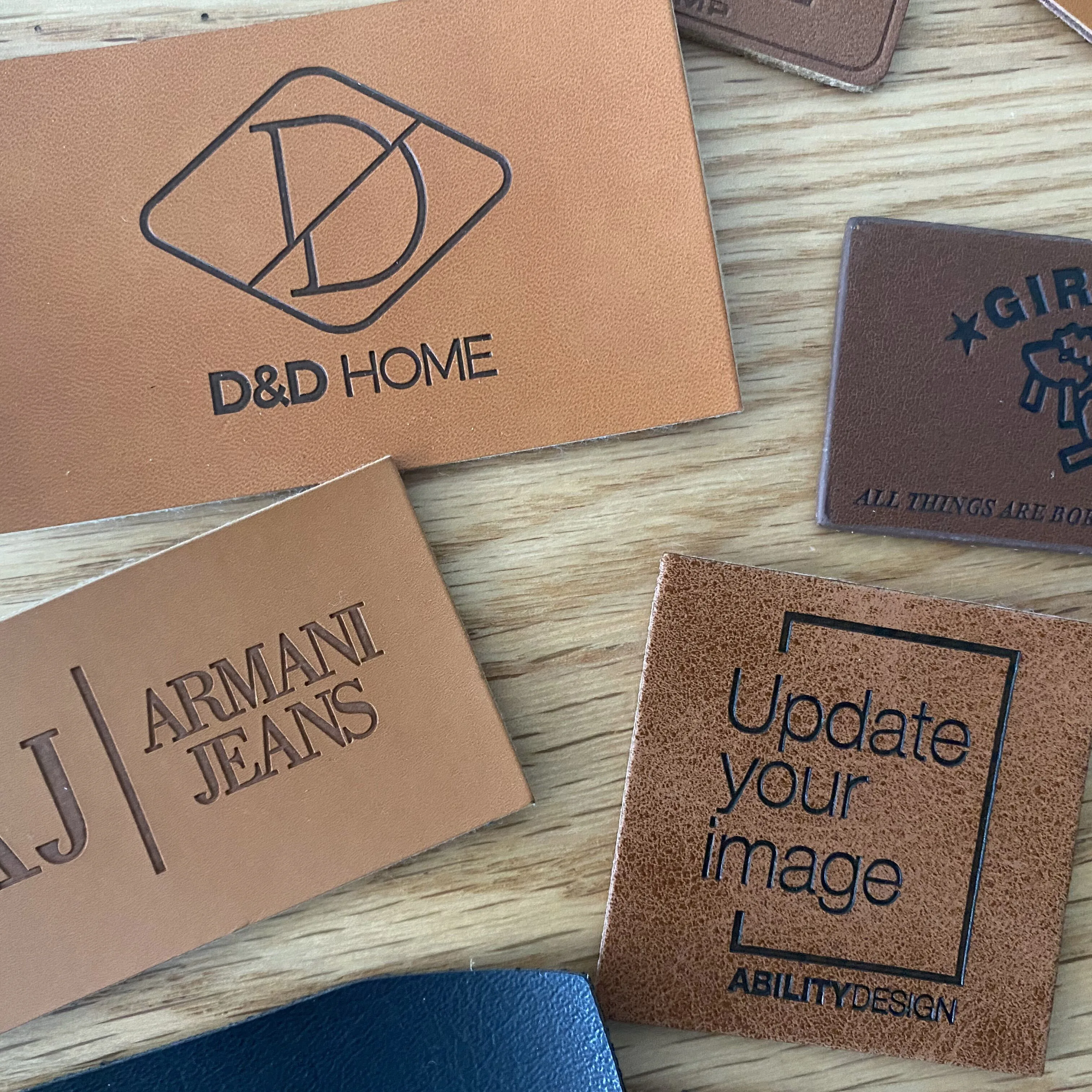 Best price Custom brand jeans clothing clothes tag pu label embossed/metal leather label patch for clothes garment