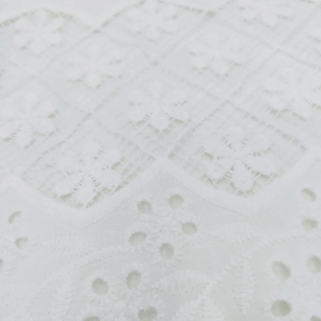 Stunning White Punched Design  fabric Adding a Splash of Color customized pure cotton  embroidery fabric for Tops