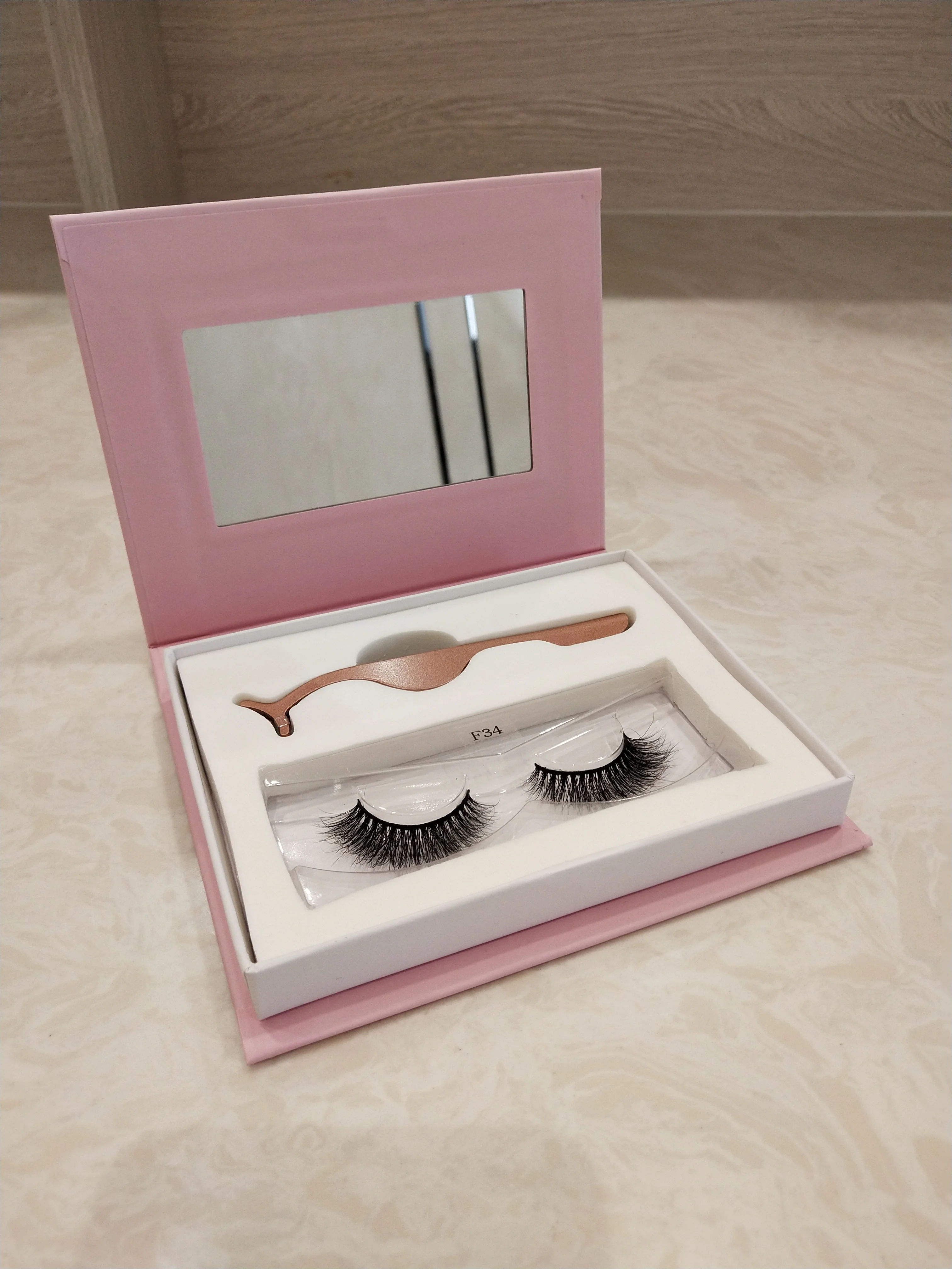 
2020 newly wholesale 3d top mink 25mm eyelash oem lashes strip custom packaging case vendors for makeup 