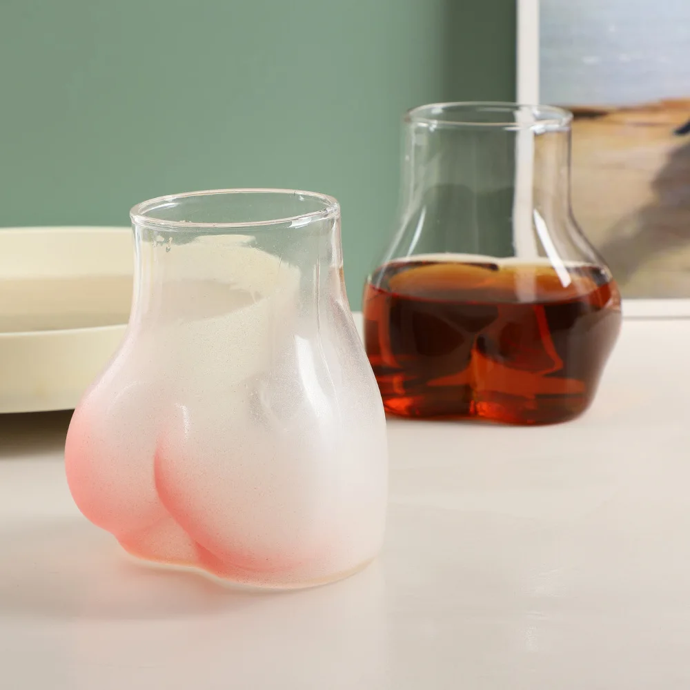 YML factory wholesale Creative personality funny peach butt shape glass  bottle pink frosted butt cup ins coffee drink cup