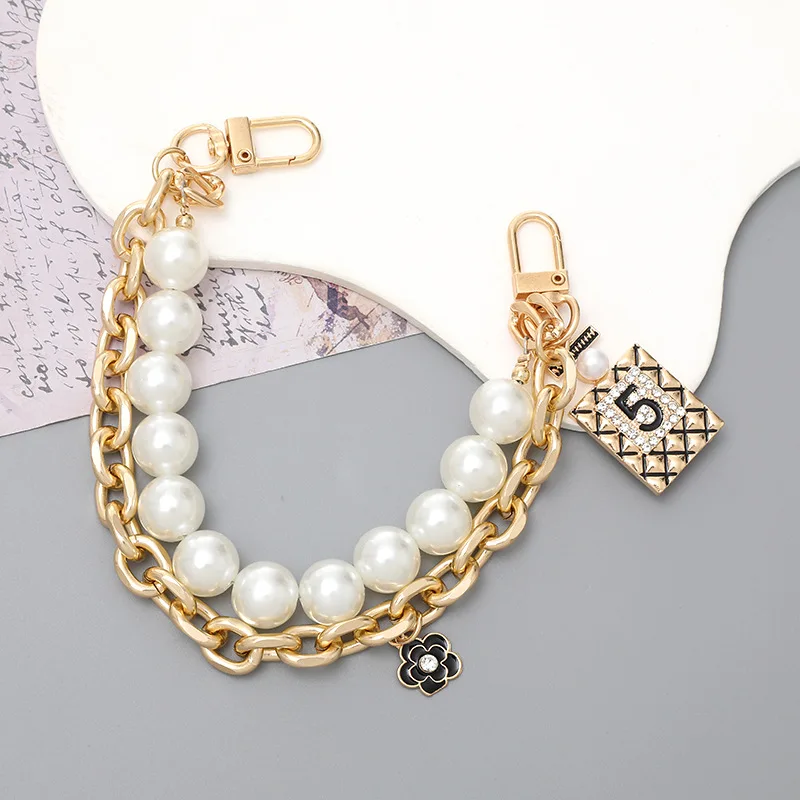 2024 Chain Link Fence Machine Gold Cuban Link  Gold Chain Plush Key  Waist   Pearl Handle Bags Chains Factory Offer