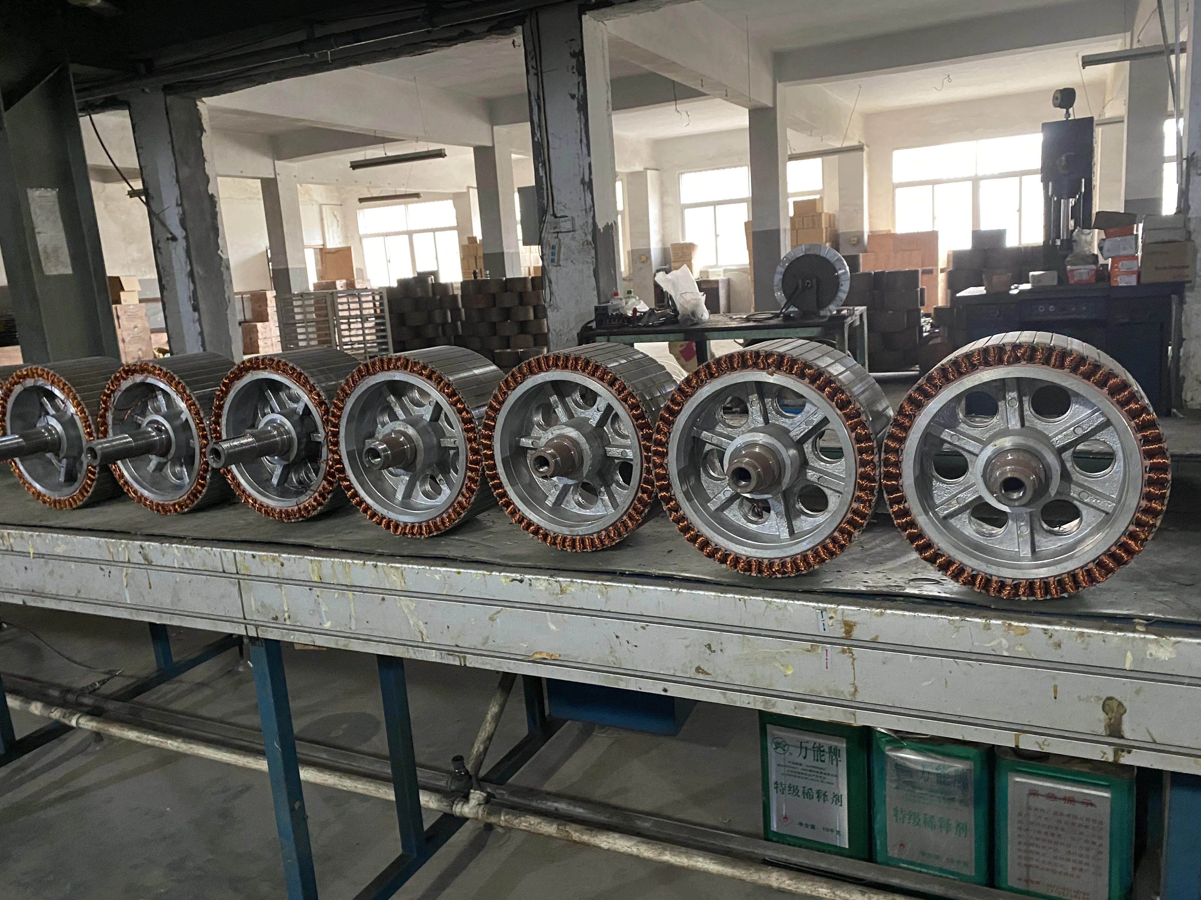 
3 generations of 7.3m 24 feet large permanent magnet gearless industrial ceiling fans for factory 
