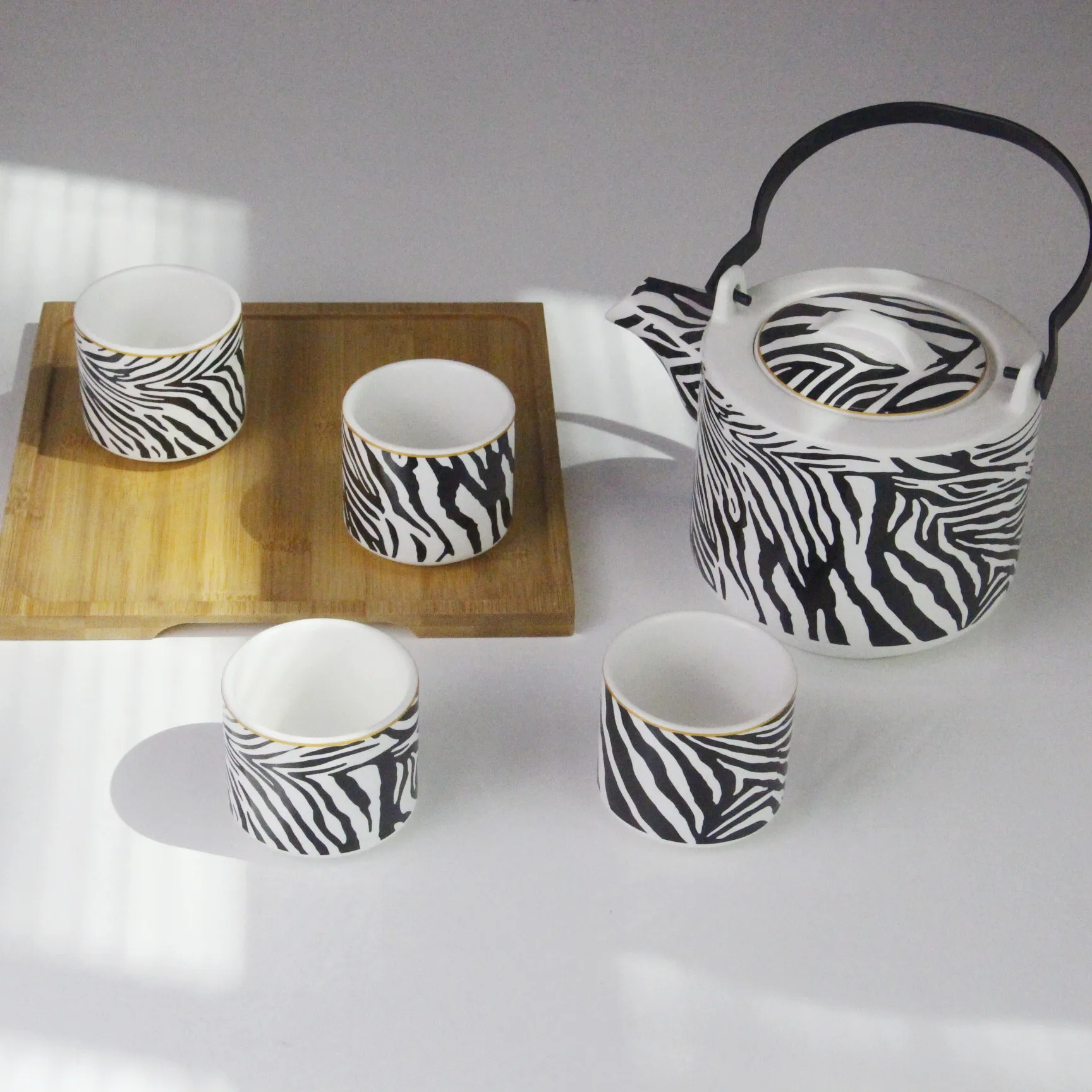 Ceramic tea set Tea pot with 4 tea cups Zebra decal pattern Bamboo wooden tray custom for daily use gift shop market