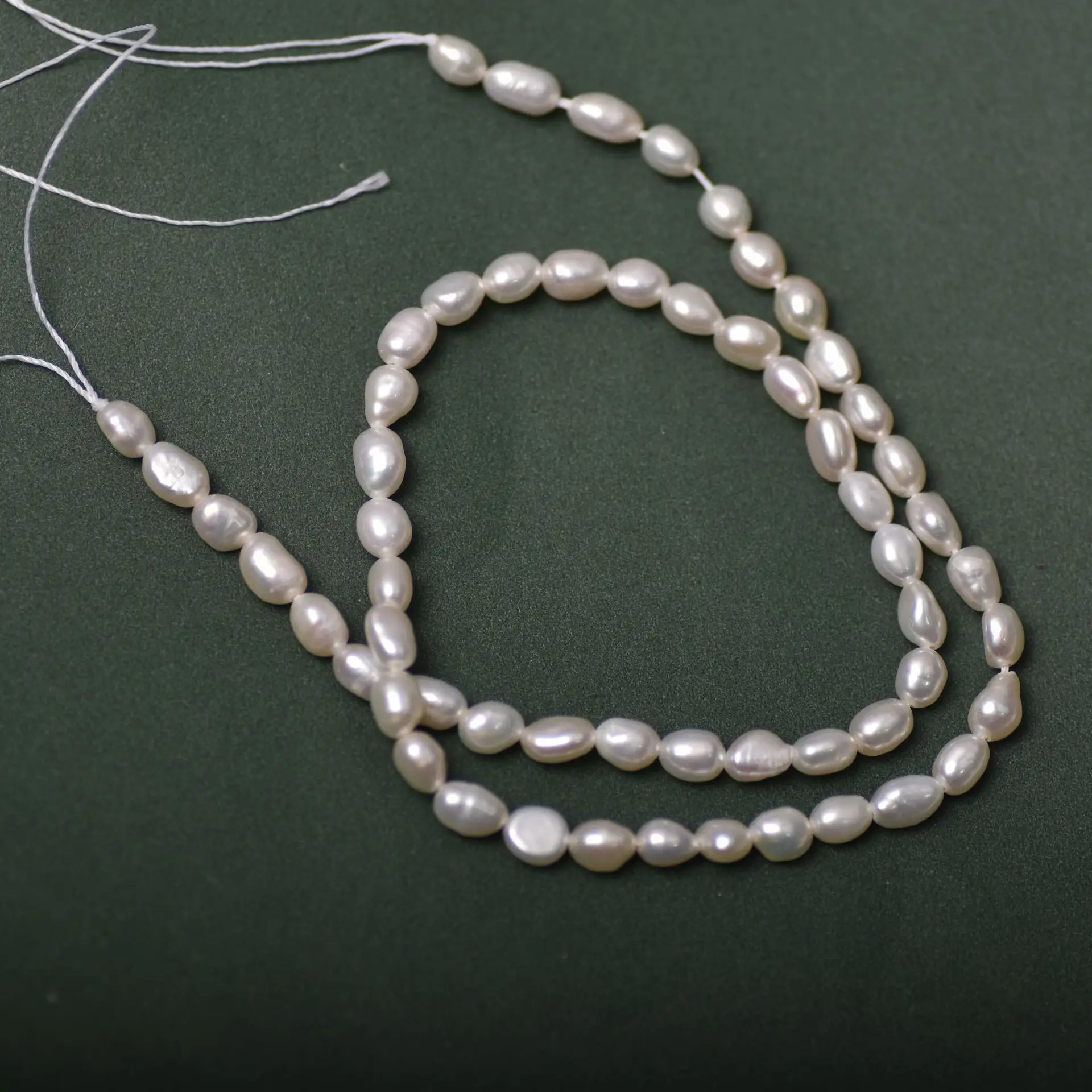 Natural Freshwater Pearls 3-4mm Natural Shiny Freshwater Rice Pearl String Wholesale