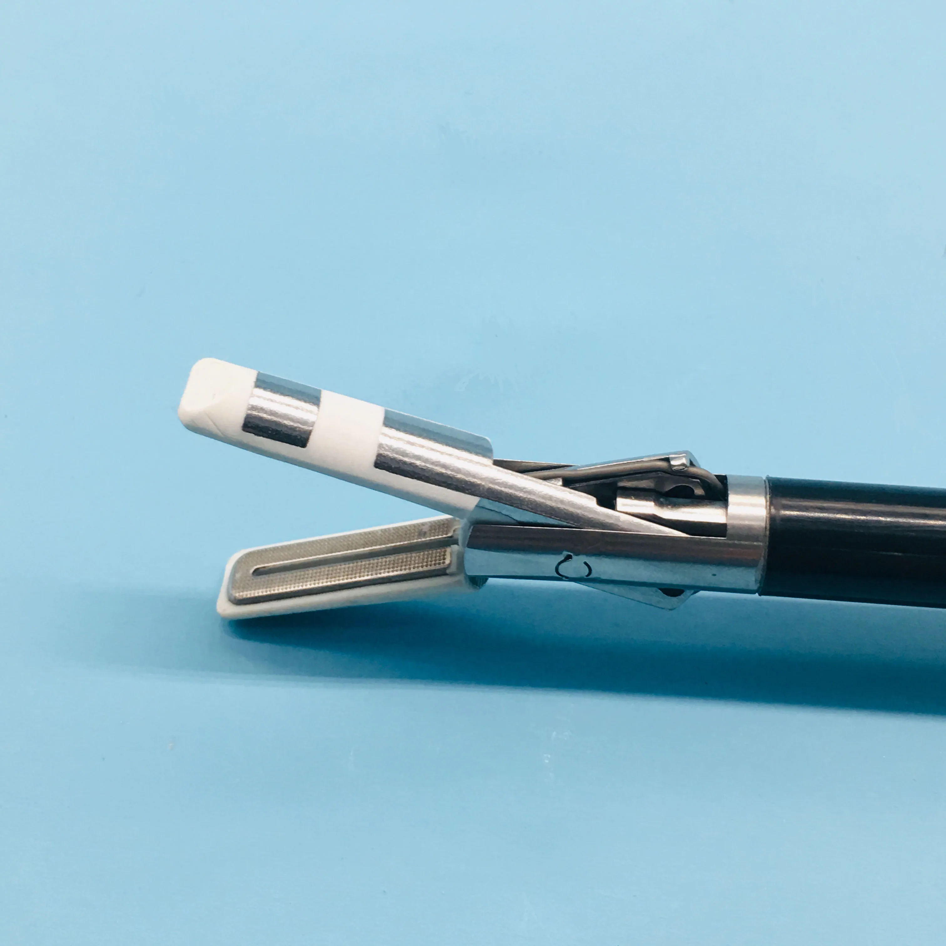 Shouliang hand switch laparoscopic grasping forceps