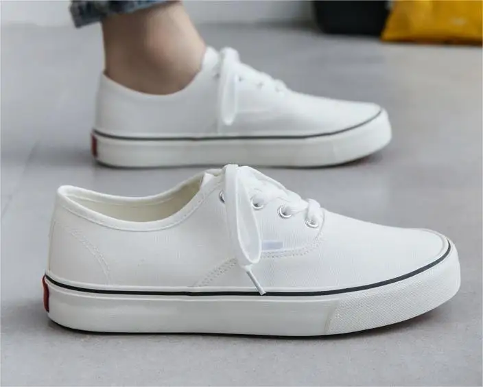 Wholesale custom fashionable low top lace up canvas shoes breathable mesh street walking sneakers