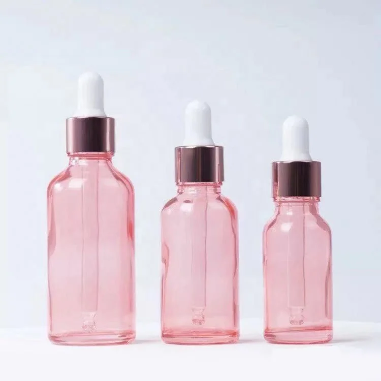 Alibaba hot selling custom size pink glass dropper bottle with delicate gift box