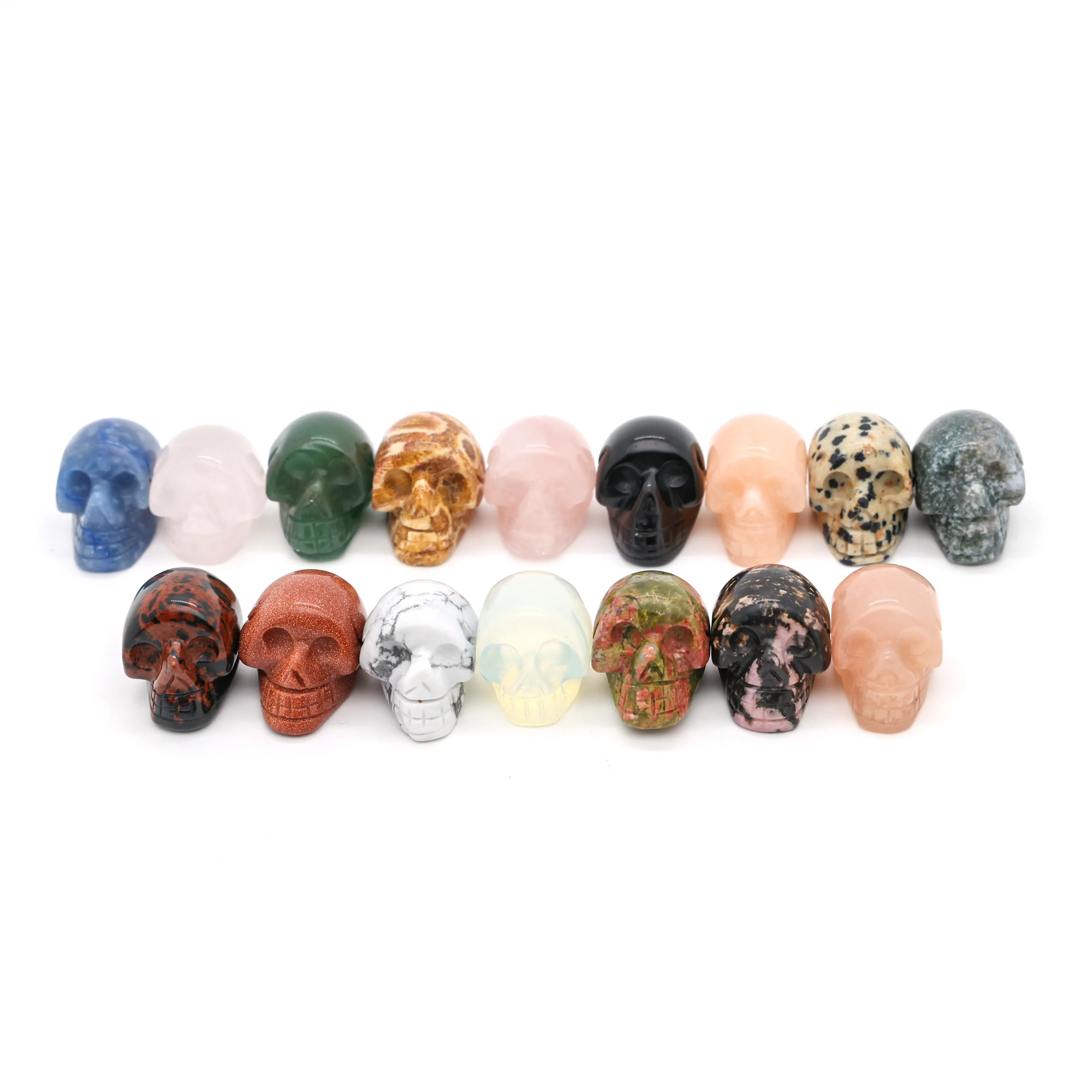 Natural crystal gem stone skulls craved  pink quartz skulls small different materials quartz carved crystal skulls