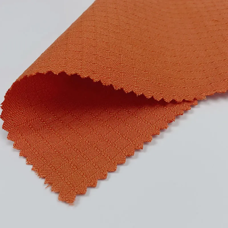 Оранжевая ткань ripstop 93% meta aramid 5% para 2% антистатическая Арамид