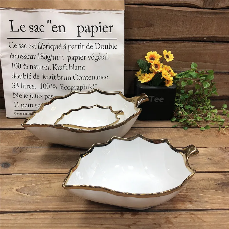 factory custom design leaf shape ceramic bowls with electroplate gold rim decoration for sale