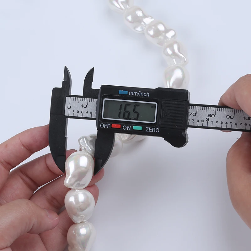 Zhuji Wholesale 16-17mm Shell Of Baroque Pearl Natural White Stands For Sale