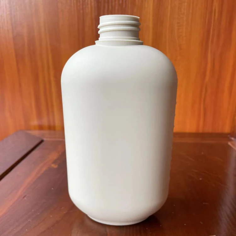 Wholesale custom 500ml plastic white HDPE round lotion bottle for shampoo body wash skin care packaging