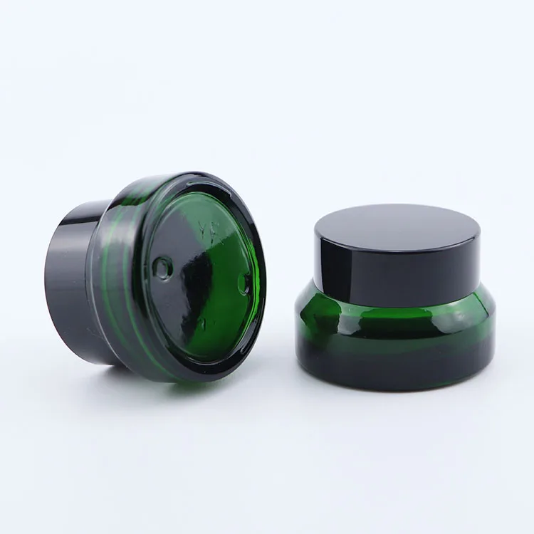 
sloping shoulder jar frosted olive green glass jar cosmetics cream skincare packaging 