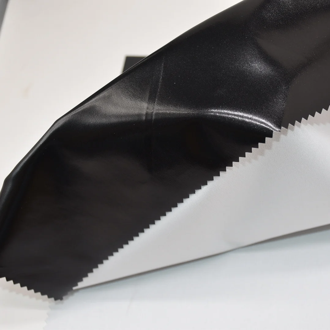 Polyester knitted fabric high elastic PU imitation leather release paper transfer coating fabric