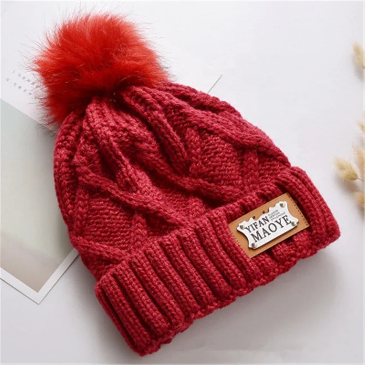 
Wholesale Winter Unisex Winter Blank Knitted Leather Label High Quality Pom Pom Beanie Hat 
