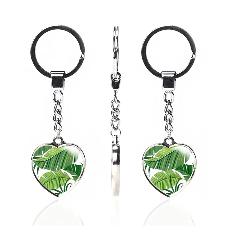 
Personalized custom tropical rainforest green plants series peach heart metal backing crystal glass keychains 