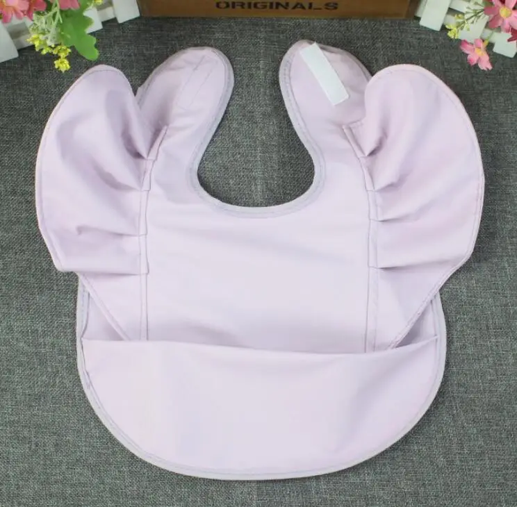 Hot selling Newborn Collapsible Button Eating Clothes Apron Cute Baby & Toddler Baby Feeding Smock Bib with Crumb Catcher Pocket