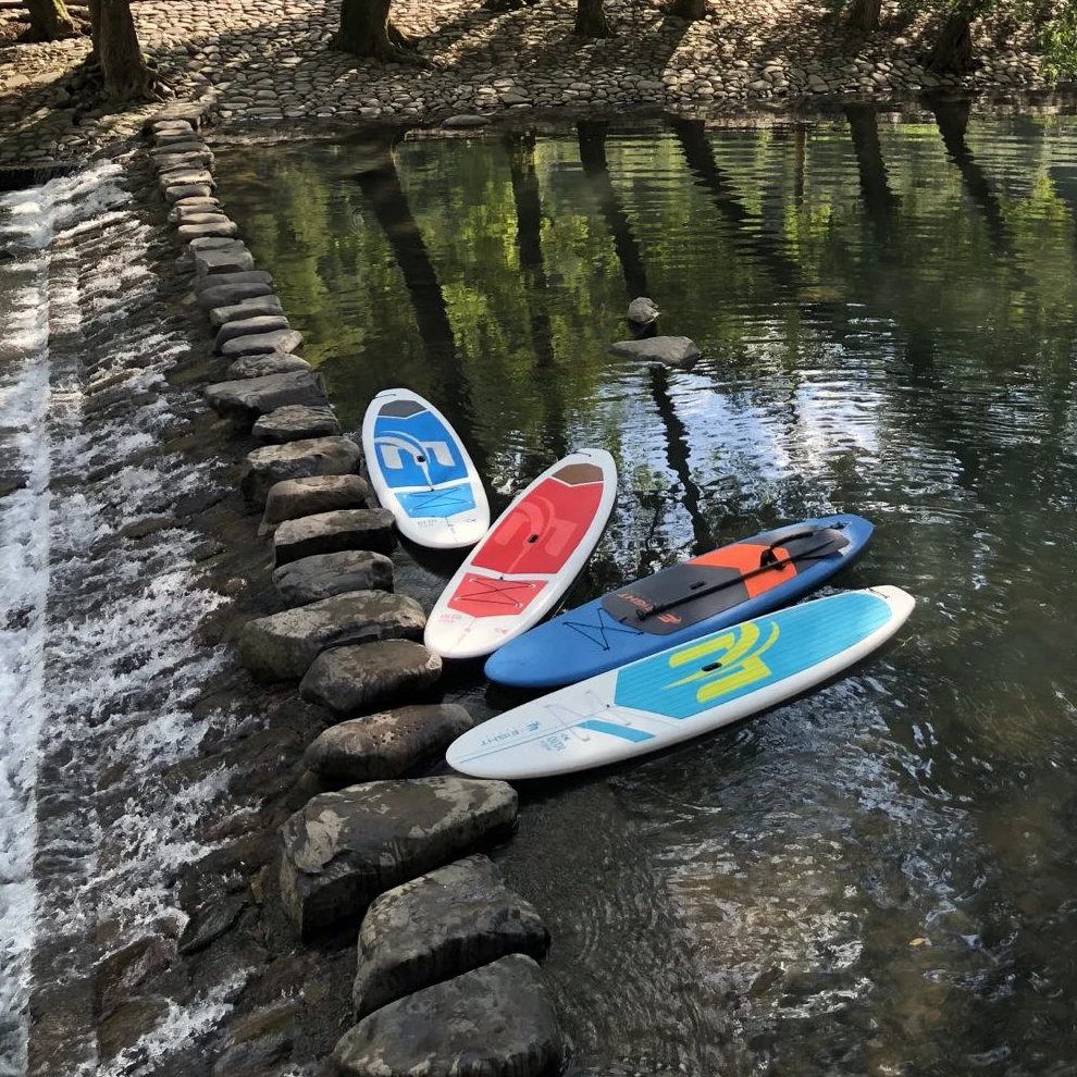 OEM Cheap Price Wholesale Customized Logo Foam Paddle Board Plastic Hard SUP Paddle Board Durable Multi-Sport SUP Paddle Board