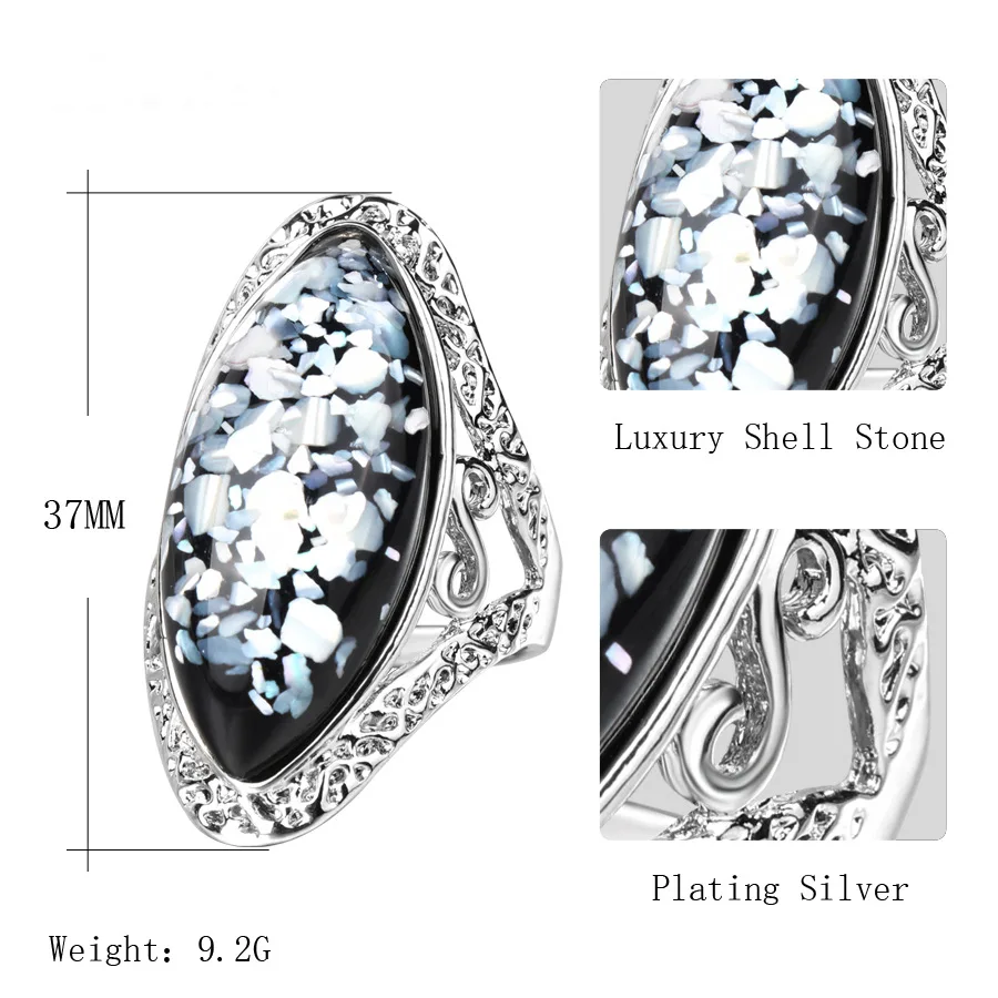 
Wholesale retro magic color shell ring alloy ancient silver carved big ring couple models 