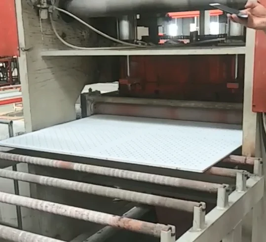 Fully automatic gypsum board punching machine.PVC veneer sound-absorbing board, automatic punching machine