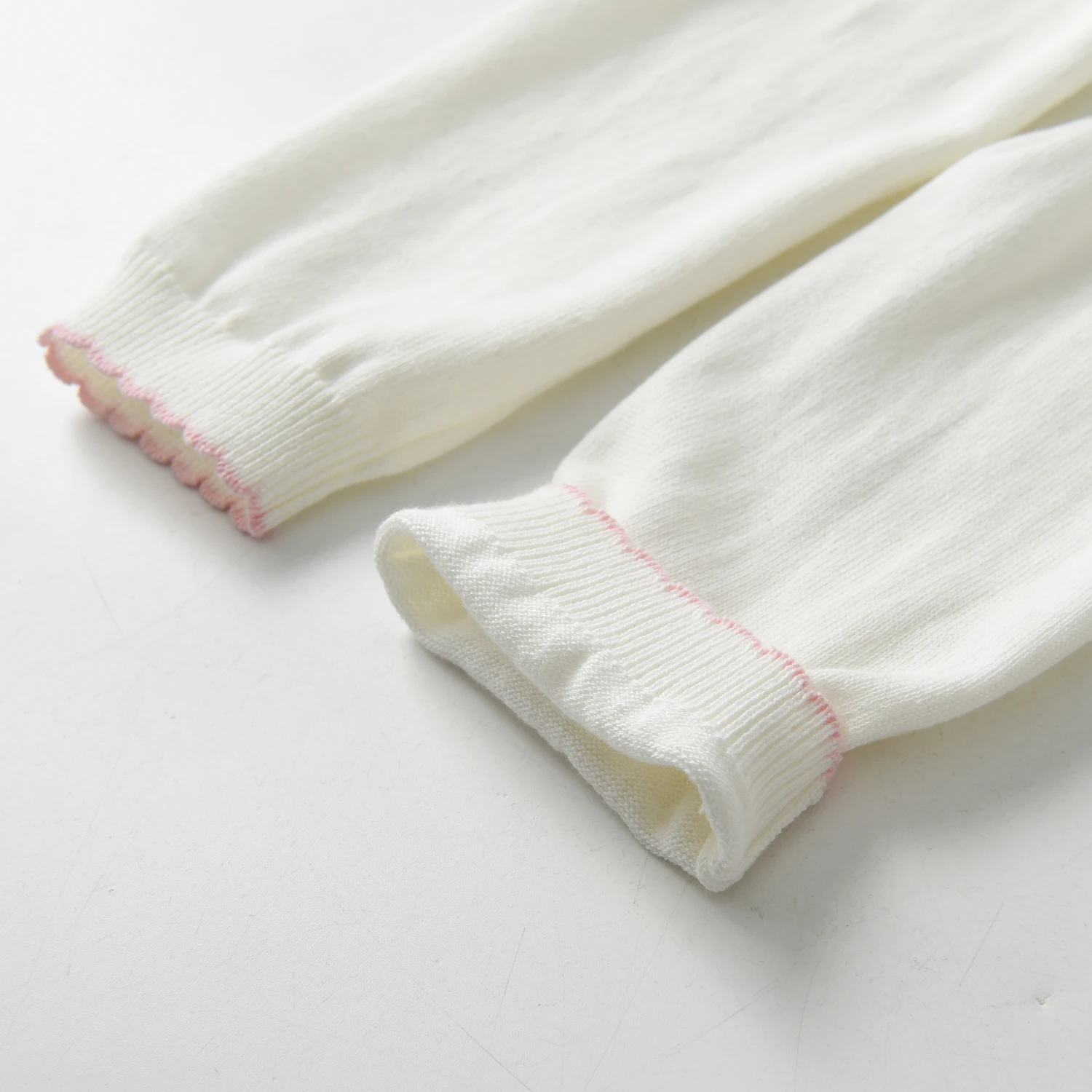 Custom ODM OEM Kids White Knitted Cardigan Organic Cotton Long Sleeve Bow Design With Button Baby Knit Sweater