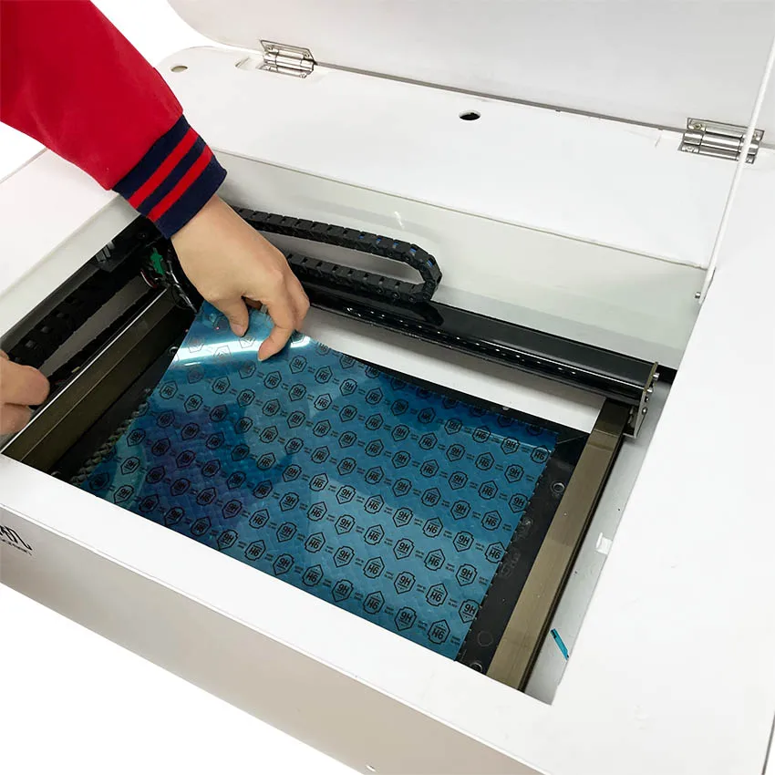 Mobile Phone Tempered Glass Cutting Machine Laser Cutting and Skin Protector for Mobile Phones