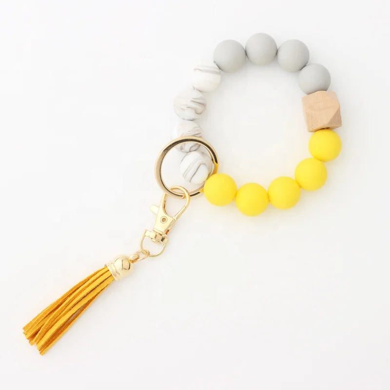 Amazon new bracelet key ring food grade silicone beads bracelet leather tassel wooden beads key chain for women