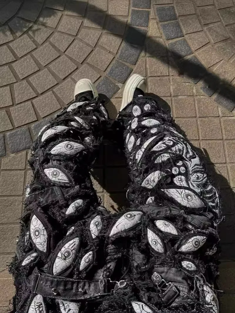 Мужские рваные джинсы
