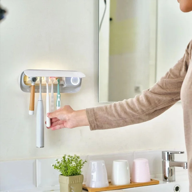Custom toothbrush holder portable UVC toothbrush box with heating dry fan rechargeable toothbrush sanitizer
