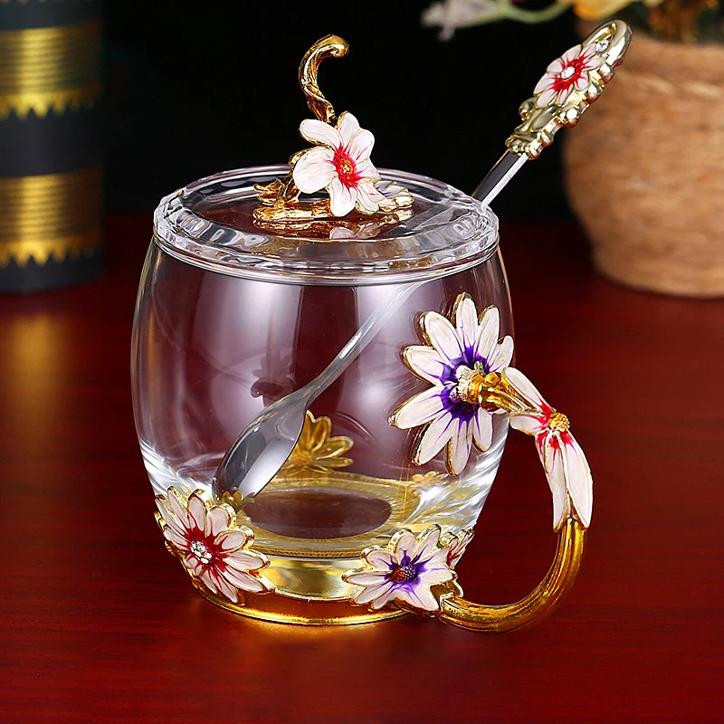 glass tea cup with enamel decoration with spoon