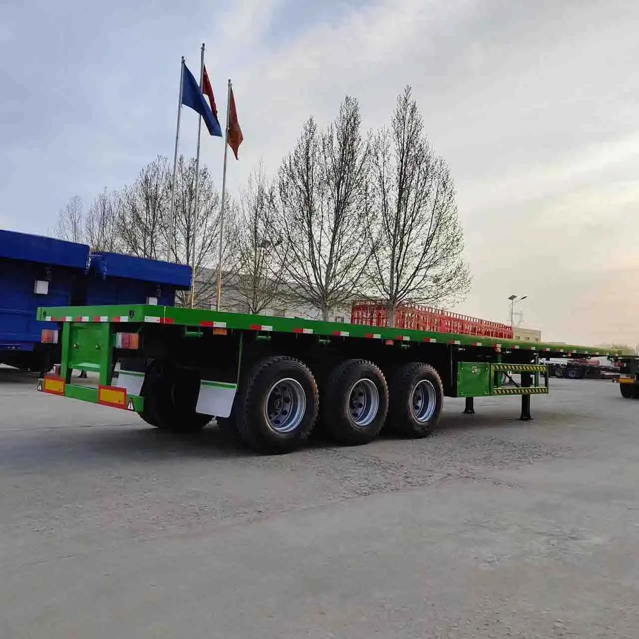 Factory supply price Flatbed Trailer 3 Axle 45FT Flat Bed Semi Trailer 40FT Container Truck 2 Axle 40FT Flatbed Trailer for Sale