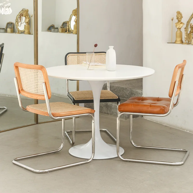 Modern designer vintage medieval luxury leather rattan dining chair stainless steel frame for dining room restaurant cafe