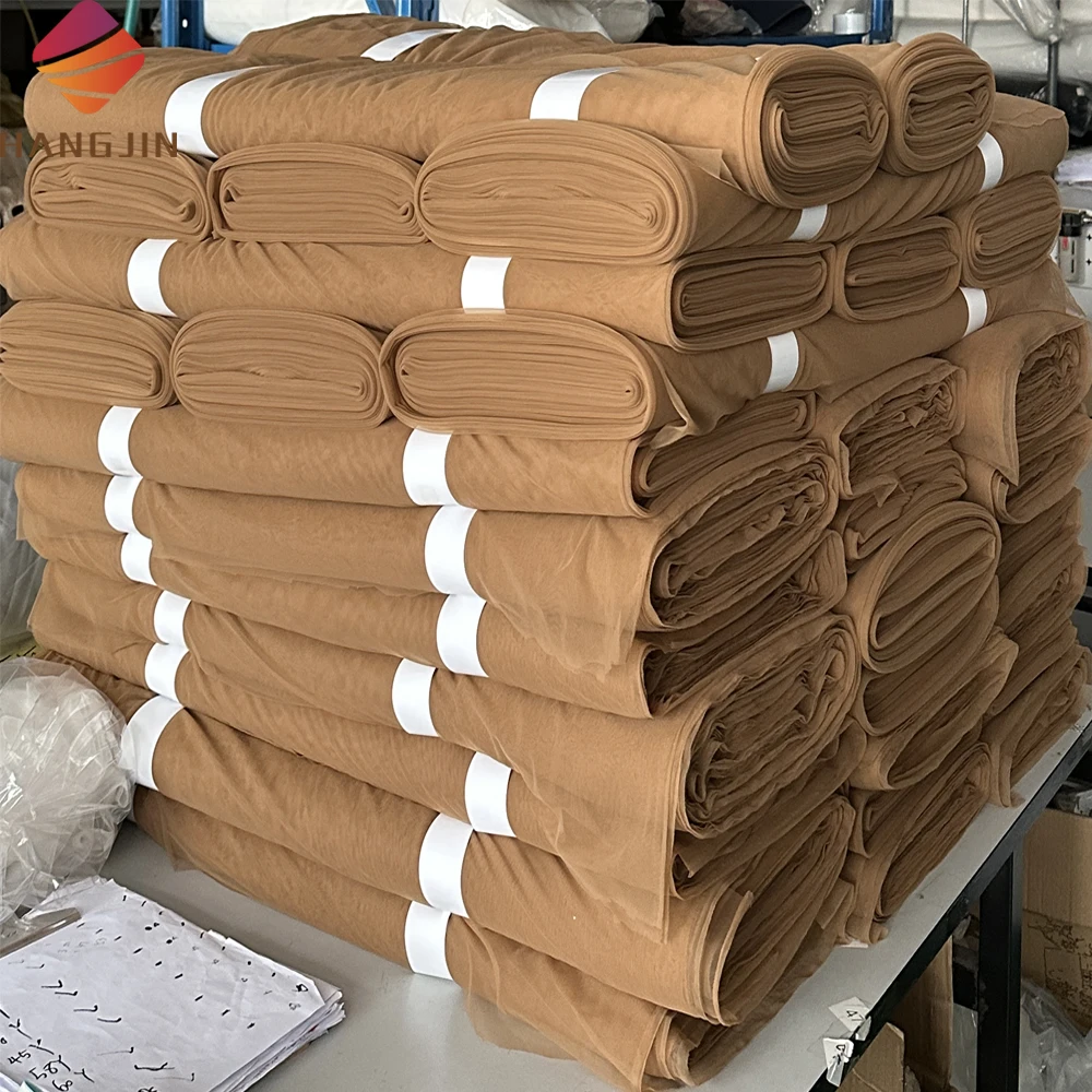 Wholesale 100% Nylon Illusion Soft Tulle Fabric High Quality 27GSM Nude Naked Skin Color Mesh Net Fabric For Wedding Dress