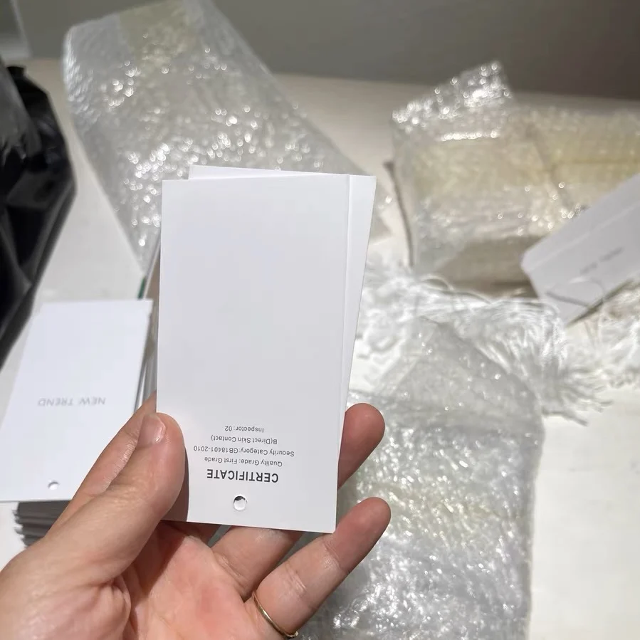 Custom Printing String Hang Tags Deeply Debossed Paper Clothing Tag