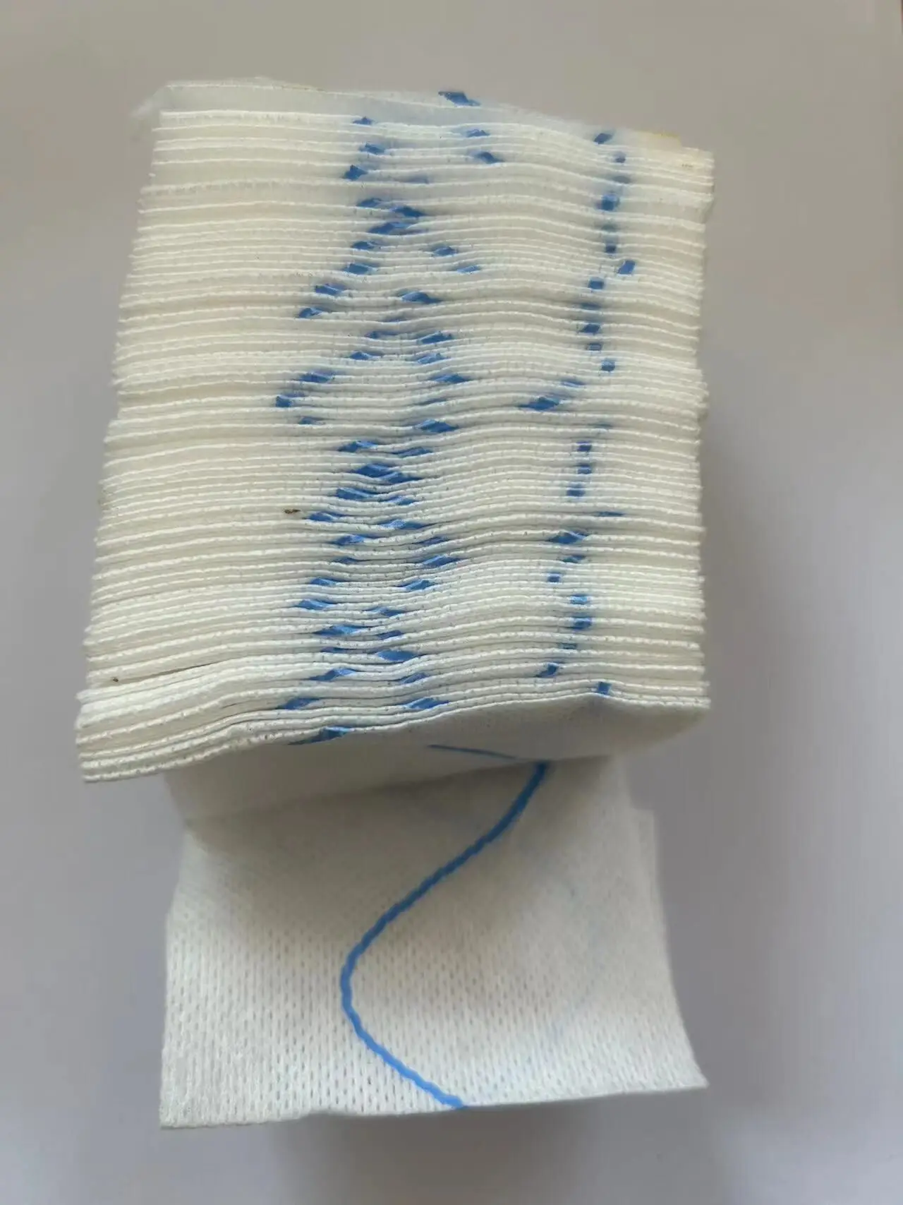 Z-folded gauze with coagulant factor