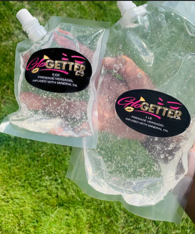 New Formula Private Label Kids Vendor Customized Key chain Max Quality Vitamin E Oil Lollipop Customized Lip Gloss Base