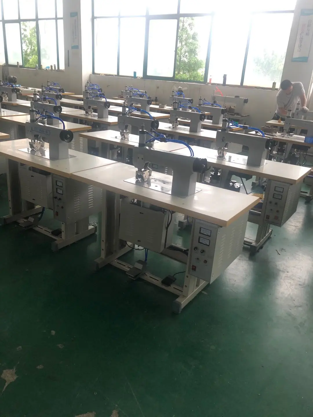 Surgical gown sewing machine