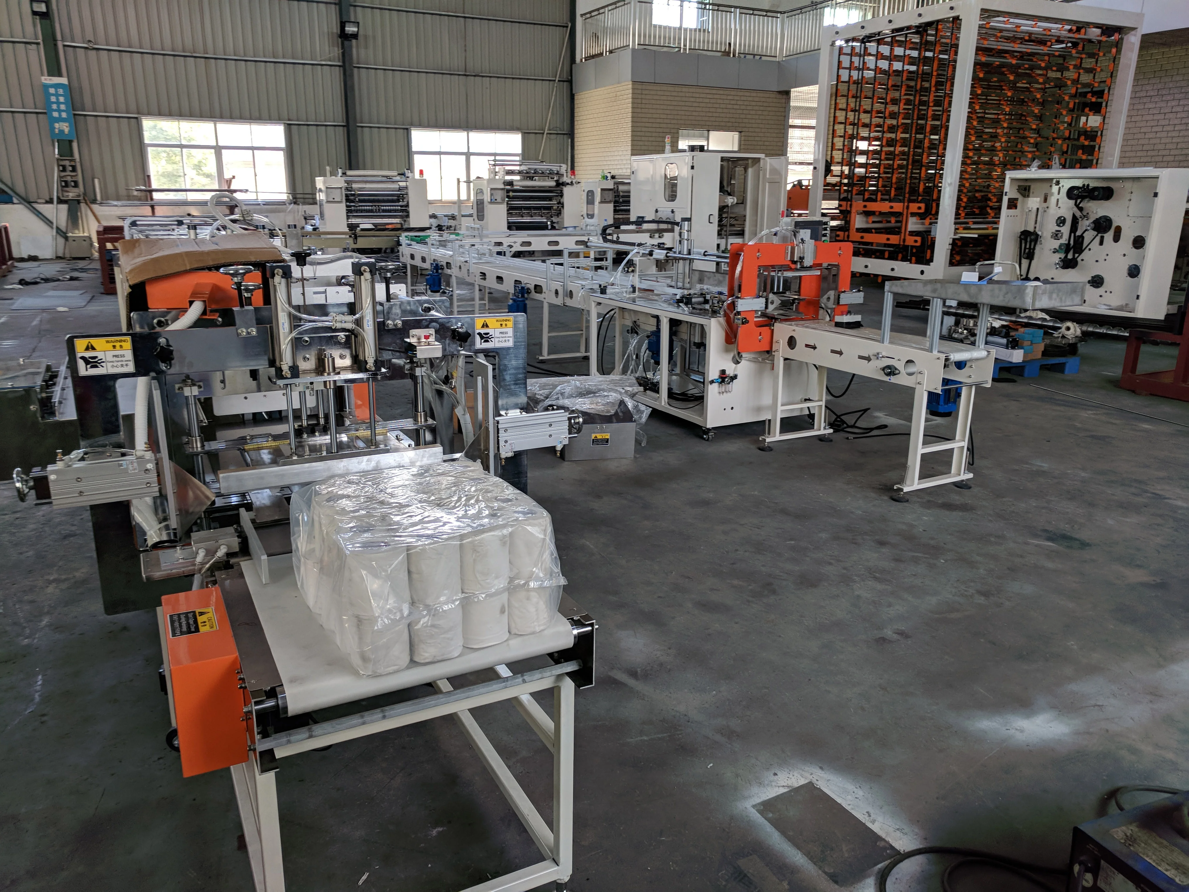 High quality color glue lamination kitchen towel production line color printing double embossing cutting packing machine price