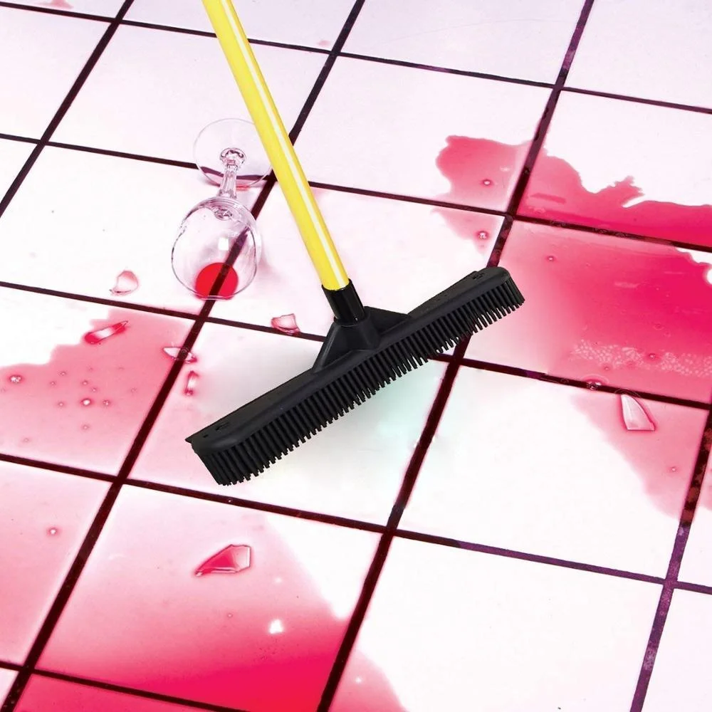 Household cleaning tools rubber broom and squeegee