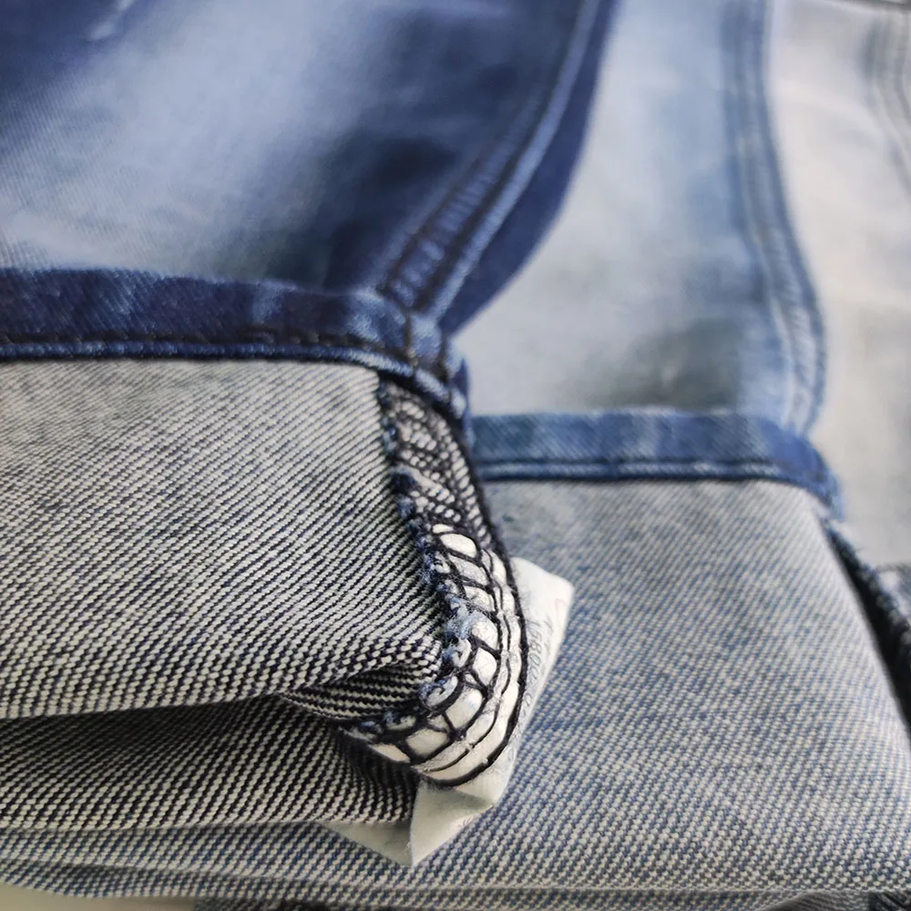 Denim fabric supplier  9.5OZ  91% cotton spandex twill fabric soft to kids fabric jeans