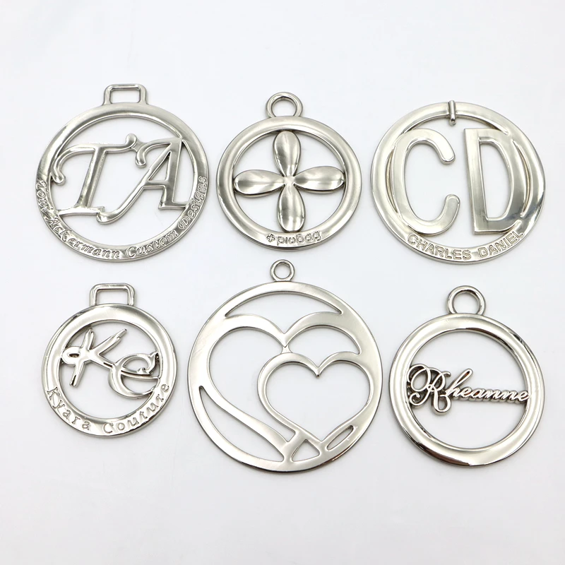 nickel round  hollow logo metal brand  logo custom hanging metal label tag for handbags