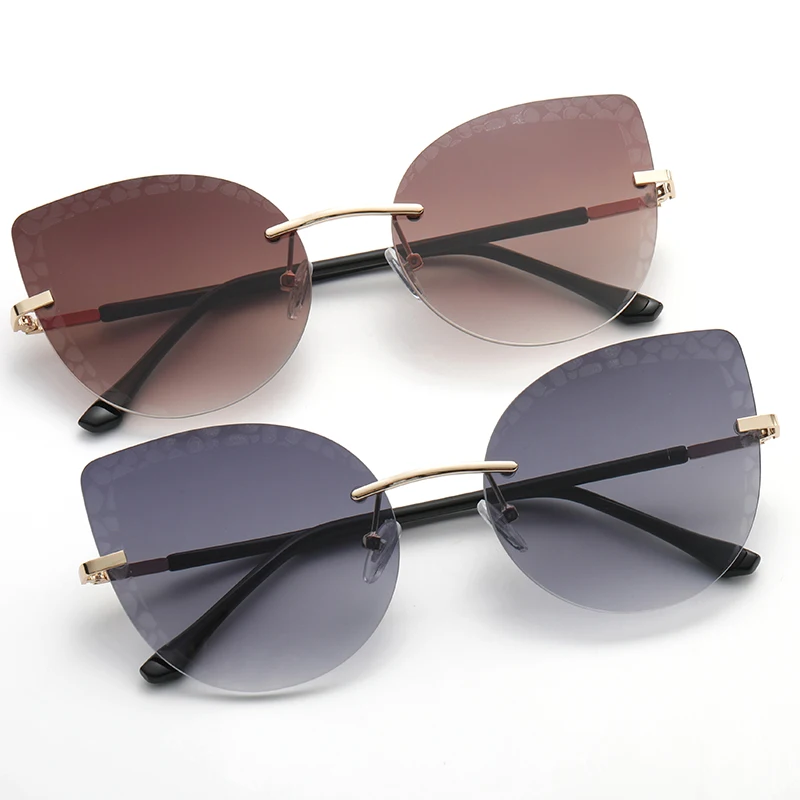2022 New Fashion Large Frame Cat Eye Rimless Cut Edge Metal Glasses Gradient Sunglasses
